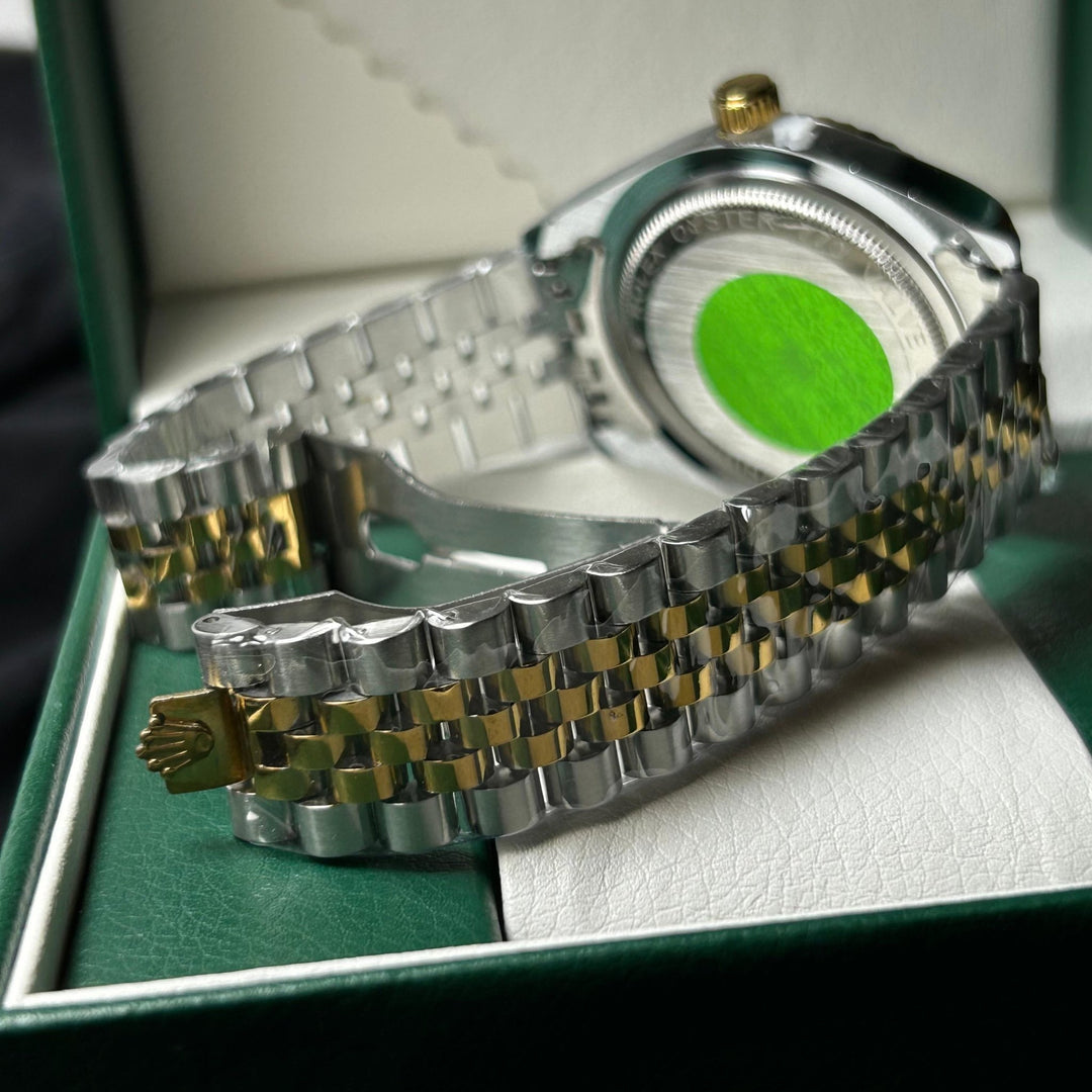 Rolex oyster perpetual in oyster steel (blue dial)